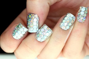 I love glitter and have produced almost 500 posts in two years.  So to say these are my sparkliest nails ever - that's pretty sparkly.  Yay sparkly!

Full post is here: http://www.polishallthenails.com/2013/12/the-sparkliest-nails-ive-ever-done-but.html