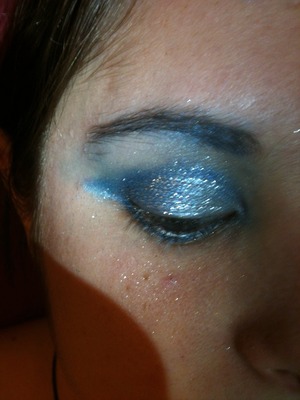 BAD LIGHT can ya tell? Used lots of blue and lots of glitter white under the eye 