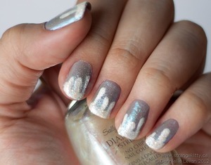 Frosty, glittery nails. If you like it, vote for my entry here: http://www.nailpolishcanada.com/holiday-nail-art-challenge-week-1-snow/