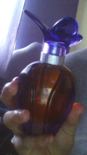 I'm in love with this fragrance and I think the bottle is pretty. I like the orange sunset shade inside the bottle.