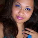 Electric blue liner and purple lipstick