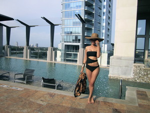 Printed scarf + cutout swimsuit + floppy hat = Cruise Chic