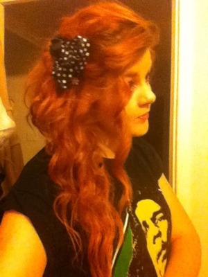 Ariel hair and cut up ribbon detail, curl with iron then pin into place