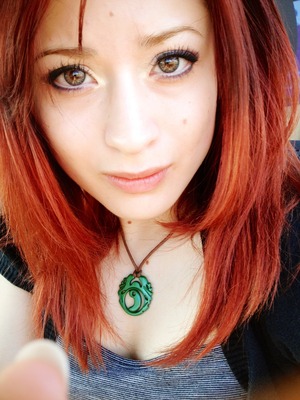 I'm naturally a brunette. I made the biggest mistake of going blonde, I couldn't pull it off. So I dyed it red. It looks a lot more natural now. :)
