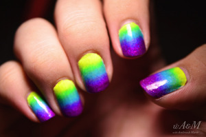 Tutorial:
http://youtu.be/sezfjPusxBI
China Glaze Neon Gradient. 
i know this sounds bimbotic, but the first day i did this, kept getting distracted when i typed :P
Guess which colours i used :)