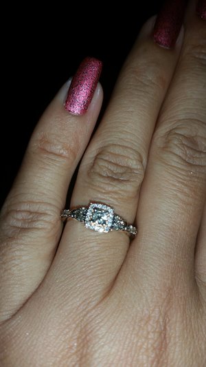 China glaze in "I love your guts" on my nails, and on my finger my beautiful champagne and rose gold LeVian ring from my king (: