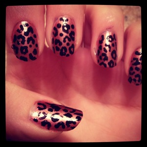 Cheeta Print Nails!
Use a tooth pic to make small circles and C's with a dark color over a nuetral one. 