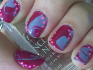 The little pink dots were made with a nail art pen from Claire's without a name.