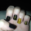 gold glitter nails black
