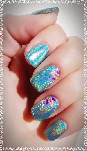Simple Flower Holo Mint Nails

A simple design, perfect for a Mother's Day theme