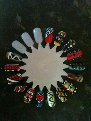 Again, sorry about the quality of the photograph.
A few designs inspired by the 'tribal' nails that are currently trending!