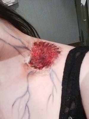 Close up on the zombie bite makeup. 