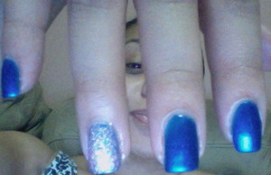 Blue with a glitter nail