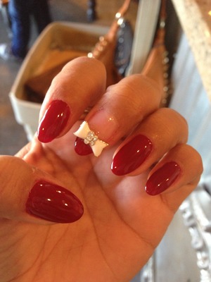 First time trying these shape and I love it!!! 
Stilettos pointy nails
Bow accessories
Ruby red color  