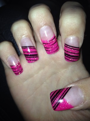 Pink gel nails black striping tape and black nail polish 