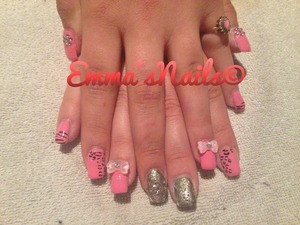 A mixture of animal print over a Barbie pink with 3D bows 
#summer #girlie #nails