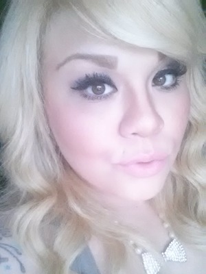 Smokey eye using bronze colors, greys, pinks and purples :)...with a nude lip;) gotta love it!