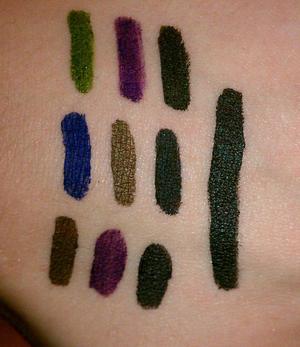 The black on the far right is the Maybelline Lasting Drama Gel Liner in Blackest Black, the 3 groups of 3 are (from top to bottom) Physicians Formula Gel Cream Liners for Green, Blue, and Brown Eyes.