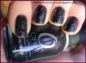 Orly's Out of the World with China Glaze's SnowGlobe on top.
Read more on my blog: 
http://rainbowifyme.blogspot.com/2011/11/orly-out-of-this-world.html
