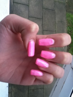 Pink sparkly long bright nails, great for summer too!