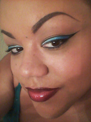 An ombre eyeliner look created with liner and eye shadow.
