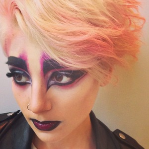 Colourful and graphic punk look inspired by Pat McGrath's work at the Met Gala "Chaos to Couture"

Mostly used Make Up For Ever & OCC. The hair was finished off with Kevin Murphy's Texture Master and Bumble & Bumble's Spraychalk.