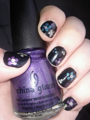 black base with holographic flowers.