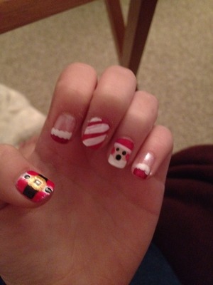 *thumb: Santa's suit
*pointer & pinky: End of Santa's hat
*middle: Candy Cane
*ring: SANTA