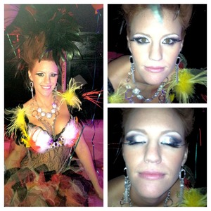Exotic bird costume with sexy make up to match