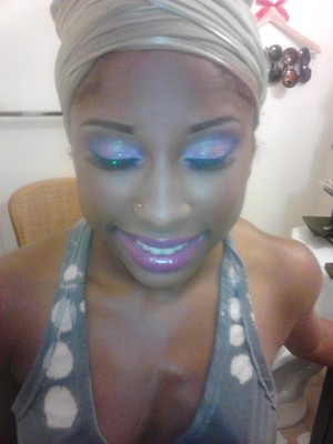 Because my daughter is extra'd out..lol.. She wanted more glitter...This was the end result of the Homecoming look. I highlighted under her eyes with a lighter concealer from the BH Cosmetics concealer palette and added MAC raisin blush (I love this stuff)..and Revlon's Berry Haute on her lip accompanied by a dab of soft pink clear lip gloss.