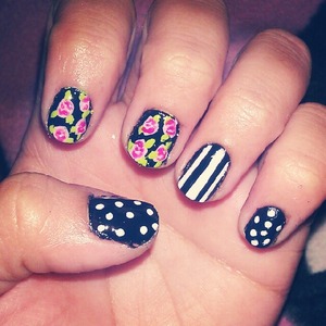 Floral, stripes, and polka dot nails.