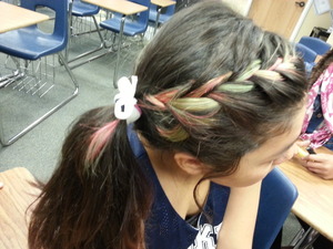 Colorful hair with a Dutch braid on the front and ponytail on the back. I did it myself. 