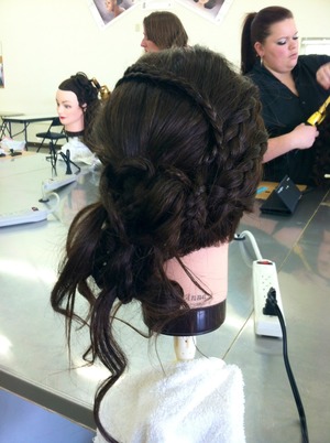 -Molly Diehl
A combination of braids, twists, and curls.
