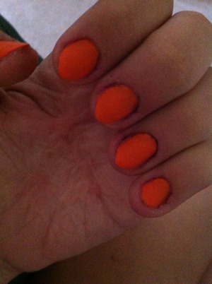 I used Avon nail polish 'orange creamsicle' and on top of tht is revlon matte top coat