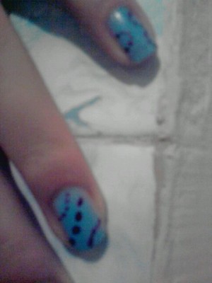 here are my nails painted in pastel blue color with a red wine colored decoration. Hope you'll like it. Liek & comment.