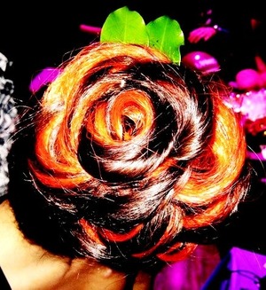Rose hairstyle.. Added some red hair extensions 