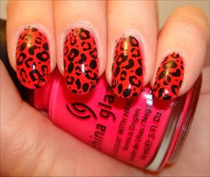 Neon Pink & Black Leopard Nails
More photos here: http://www.swatchandlearn.com/nail-art-neon-pink-black-leopard-manicure-using-the-konad-m57-image-plate-konad-nail-art-swatches/