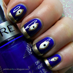 Gold (China Glaze Passion) lined eyes and tips against a backdrop of Revlon Royal.

Here is the blog post:

http://polishrainbow.blogspot.com/2012/10/reddit-52-week-challenge-week-2-blue.html