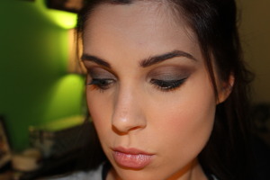 Black eyeshadow all over lid, blended out with a medium brown in the crease.