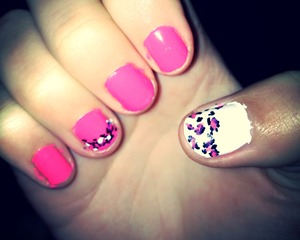 Pink and white cheetah print nails