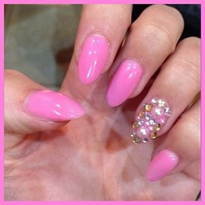 acrylic extensions with gel polish and rhinestones
