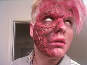 Another SFX makeup i did with liquid latex and tissue paper and really crappy grease paint lol