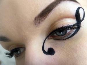 http://missbeautyaddict.blogspot.com/2012/04/make-up-challenge-creative-eyeliner.html