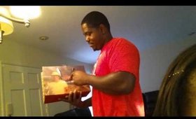 Anthony opens his gift
