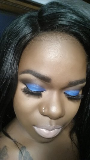 berry blue lid with a sharp cut crease