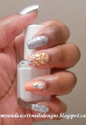 For this manicure the polishes I used were China Glaze Peachy Keen,Hard Candy So So Sequin, Sally Hansen Celeb City and Essie Marshmallow. I applied a mix of Born Pretty Store's Studs and one pearl I purchased from a arts and craft store. 