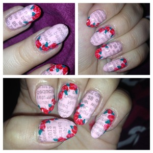 I haven't uploaded on here in ages! I thought I would try something different and did newspaper nails but added some flowers! I think this is really cute for valentines day. It's a little messy but I think it looks okay! 