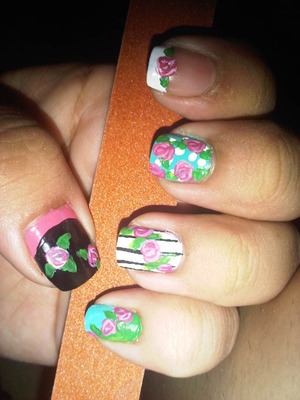 I love anything dainty!

I did my friends nails a few months ago and I was inspired by the dainty flowers. :)