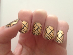 For Christmas I received a pack of technic nail foils and have been way to scared to try them. 
These are a really cool gold metallic with a sort of black brick outline pattern. I found these to be very big for my nail and did have to cut all of them smaller and they are were not staying flat by the tips if my nails. Look wise thought they look awesome. 
slightly scared to do my right hand now though…...  