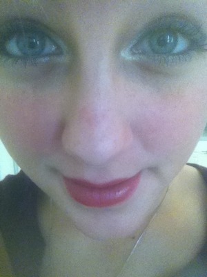 Mascara,eyeliner,and red lipstick...